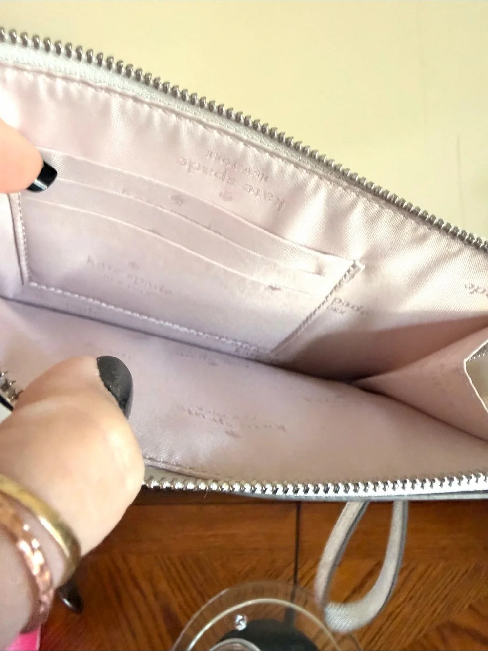 kate spade Lucy Silver Glitter Wristlet in color Lunar Light Like new